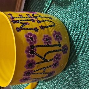 Large yellow pottery mug